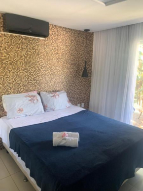 Pratagy Quarto e sala com jacuzzi